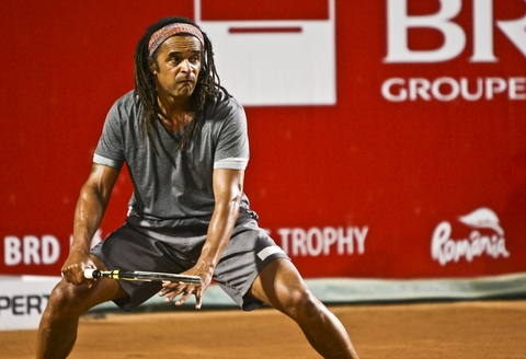 Portrait of Yannick Noah emphasizing his Cameroonian and French heritage