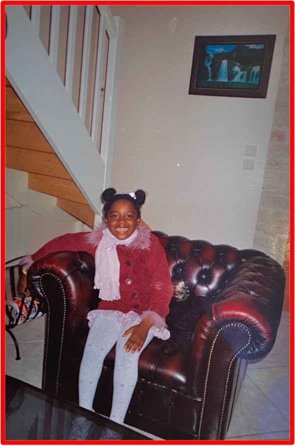 Orchidée shares another childhood picture. The Bridge MAG. Image